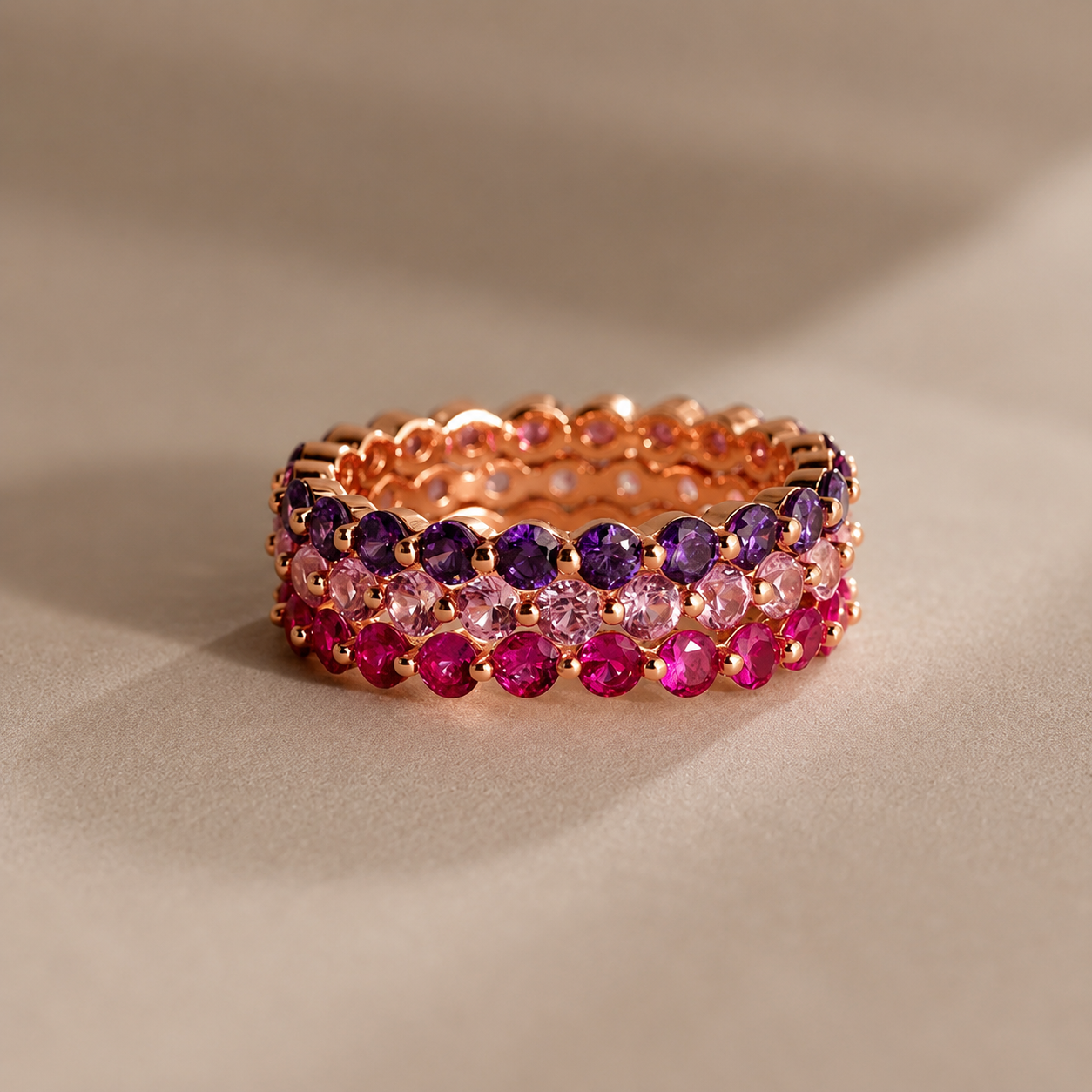 Multicolored gemstone ring on a beige background